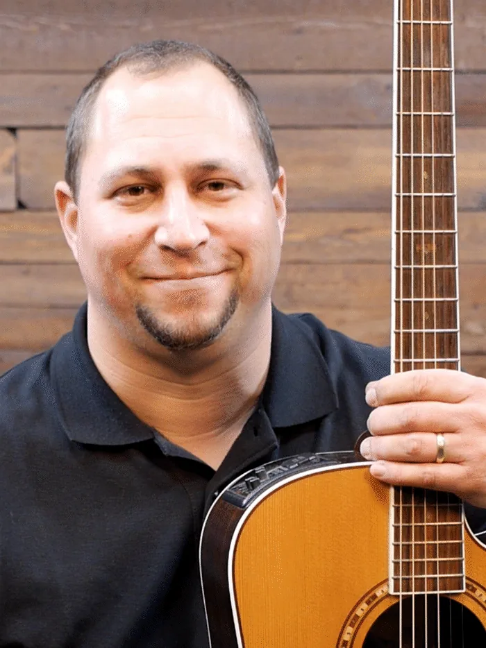 Jonathan Boettcher with his guitar
